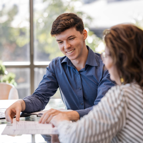 A smiling accountant with a headset providing professional services